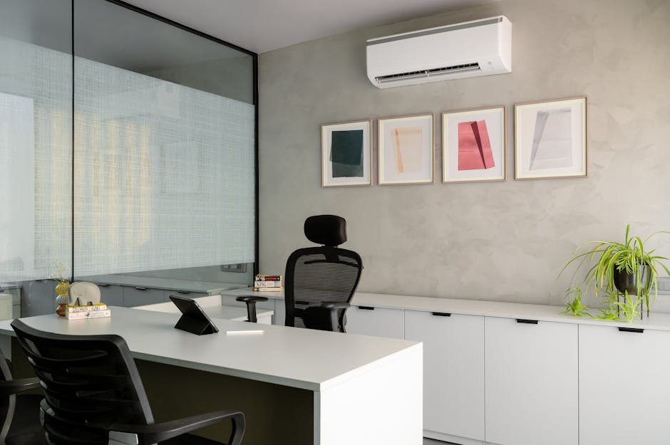 Contemporary office space with a sleek desk and modern decor, perfect for a professional setting